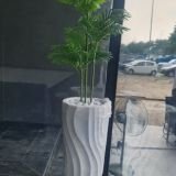 Artificial Areca Palm Tree in Sculptural White Wave Planter